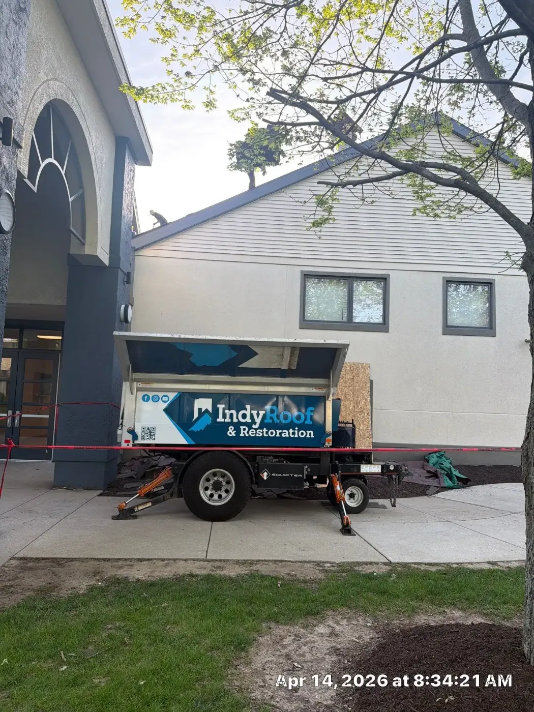 Tarping and dry-in on a Bedford commercial roof